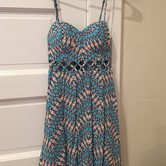 Printed dress with built in bra and strappy cutout