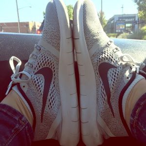 Grey Nike frees