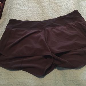 Size 10 black lululemon running shorts