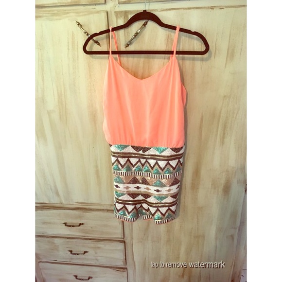 Coral Aztec sequin romper.