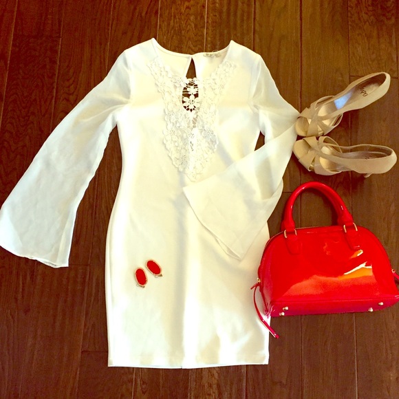 Flirty white sleeved dress