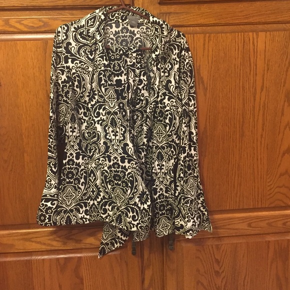 Beautiful black and white wrap blouse. Worn twice