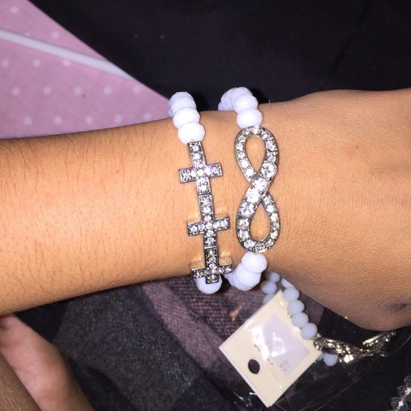 White cross and infinitely bracelet set