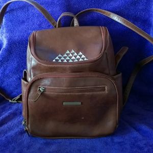 Faux-leather backpack w/ studs.