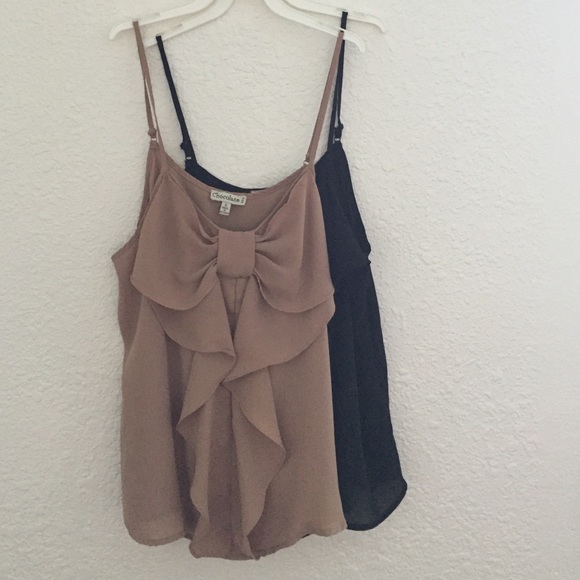 Two of the same bow tops. 12 dollars for both