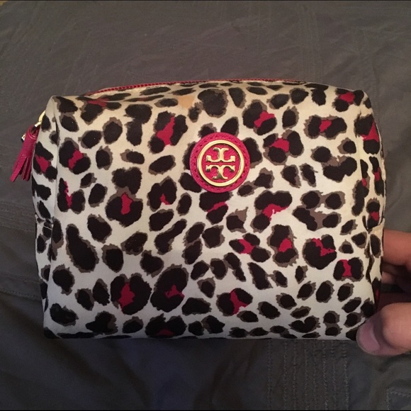 Leopard Tory Burch cosmetic bag.