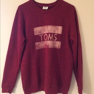 Toms red sweater