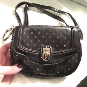 Small guess cross body purse.