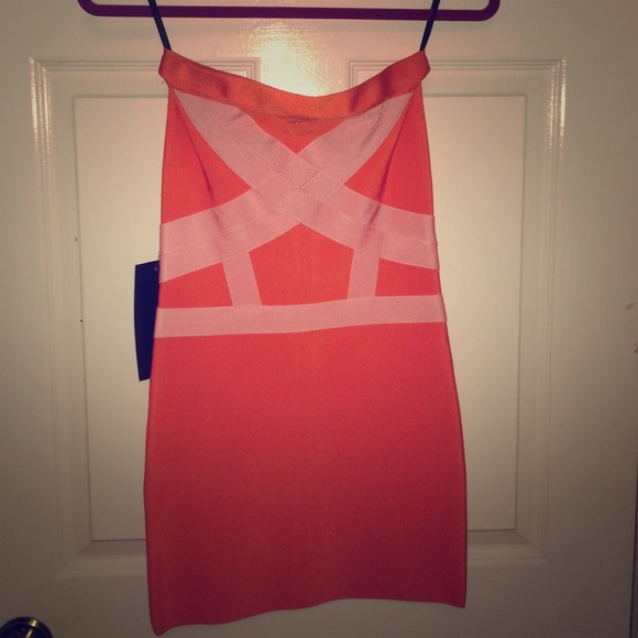 New with tags orange Bebe bandage dress