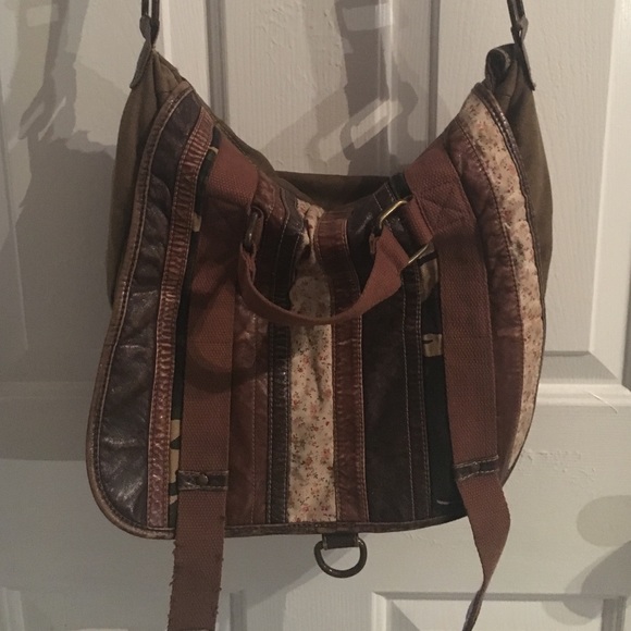 A brown body strap bag