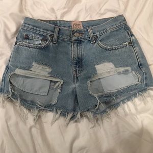 Mid rise ripped denim shorts