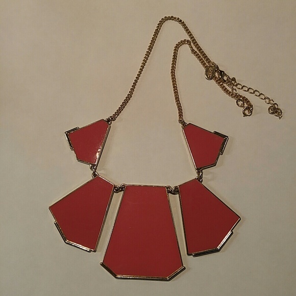 mark. Gold and Coral necklace.