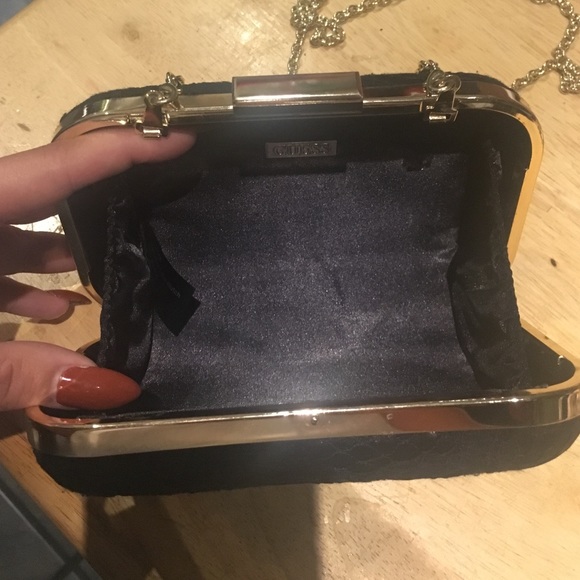Black and gold guess clutch - Picture 2 of 3