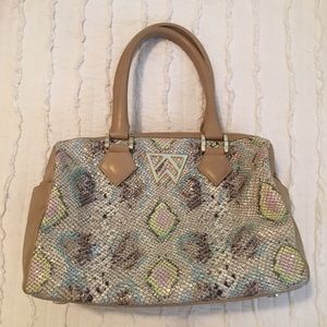 KELLY WYNNE PURSE: colored snake. Used 3 times.