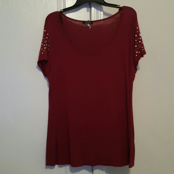 Burgundy colored top by Deb