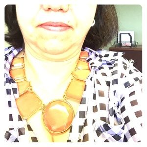 Beautiful gold and orange statement necklace