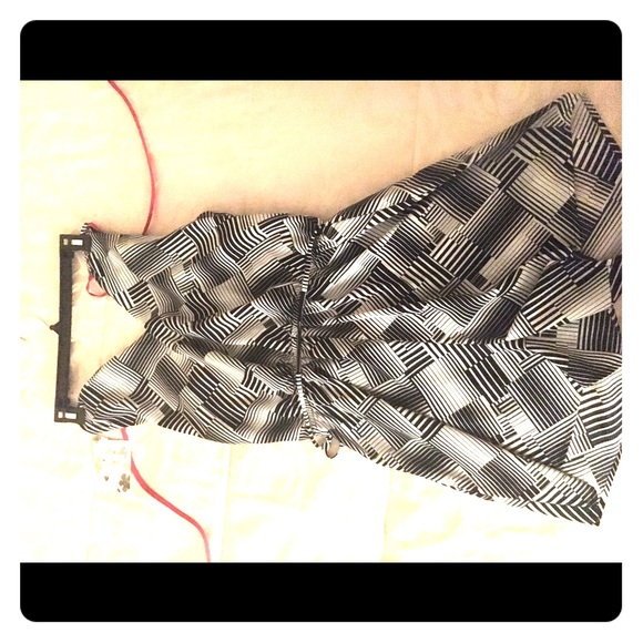 Beautiful black and pink romper, never worn.