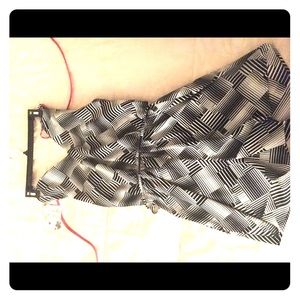 Beautiful black and pink romper, never worn.