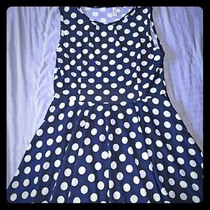 Navy mini sleeveless dress with white dots