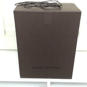 Louis Vuitton box with a leather strap