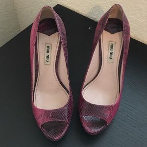 Snake skin pumps