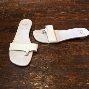 White Christian Louboutin sandals