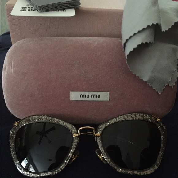 Miu miu sunglasses.