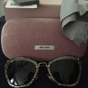 Miu miu sunglasses.