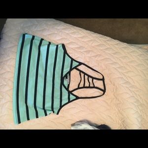 striped crop top with open back design