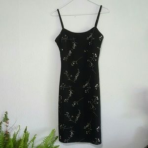 Cute little black slip on dress.
