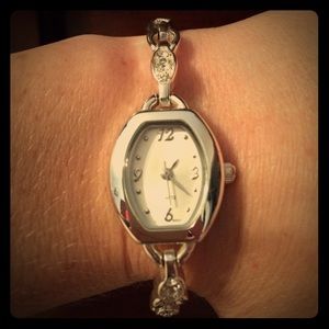 Clasp watch with jewels