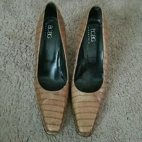BCBG camel colored pumps.