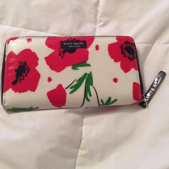 kate spade Handbags - Authentic Kate Spade poppies zip around wallet