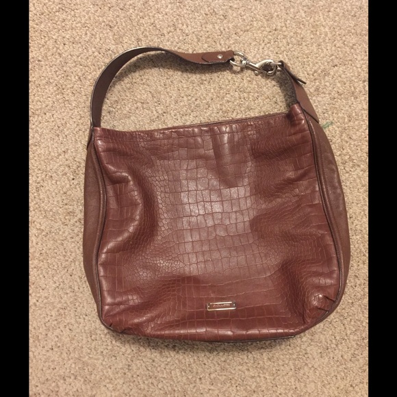 Brown leather coach purse