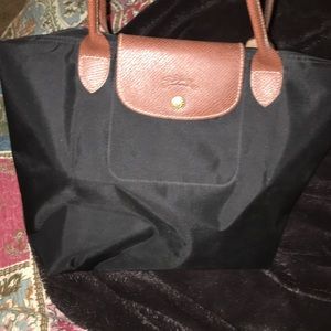 Barely used Longchamp black and brown purse!