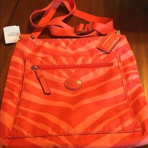 BRAND NEW! Coach shoulder bag never used.