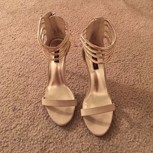 Dollhouse shoes in gold/cream size 9.