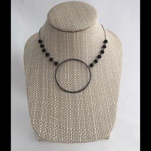 Gunmetal silver karma circle necklace