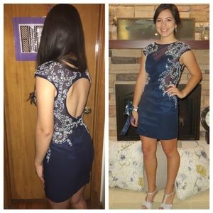 Navy blue tight short homecoming dress.