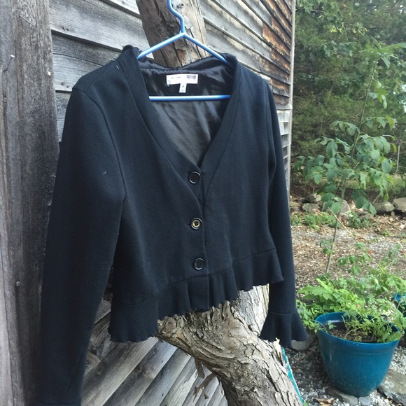 Hooded long sleeve sweatshirt with bell cuffs.