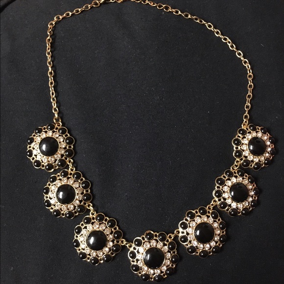 Gold, black and diamond necklace