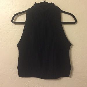 Black sleeveless turtleneck