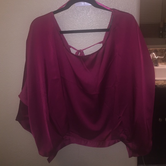 Burgundy flowy top. Not taking offers.