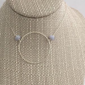 Silver karma necklace. Pale blue agate stones.