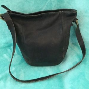 Vintage black leather coach bag.