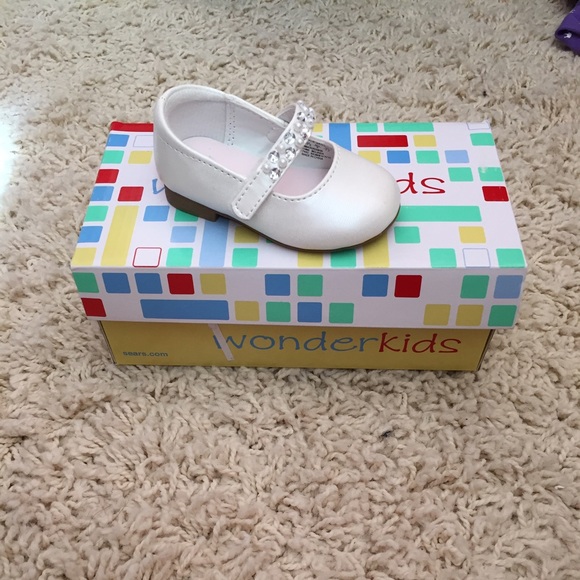 White baby shoes