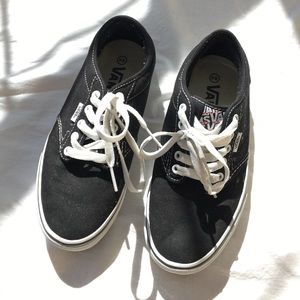 Black and white Vans sneakers