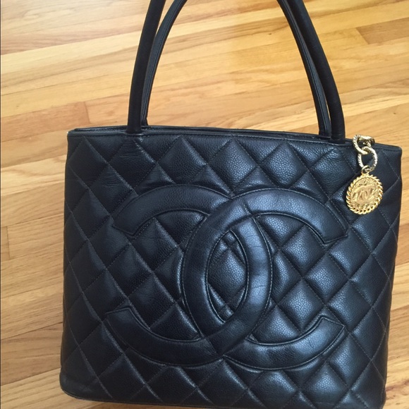 100% authentic , Chanel medallions hold