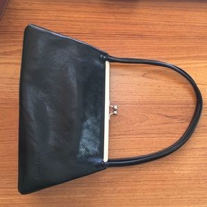 Black leather handled clutch with gold clasp