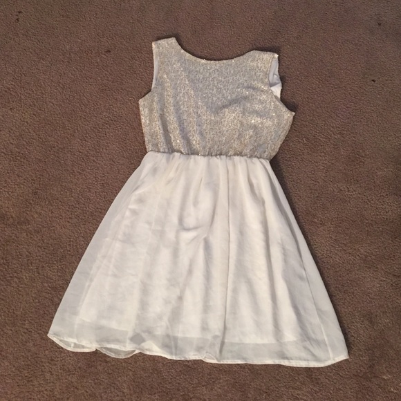 White and gold dress.